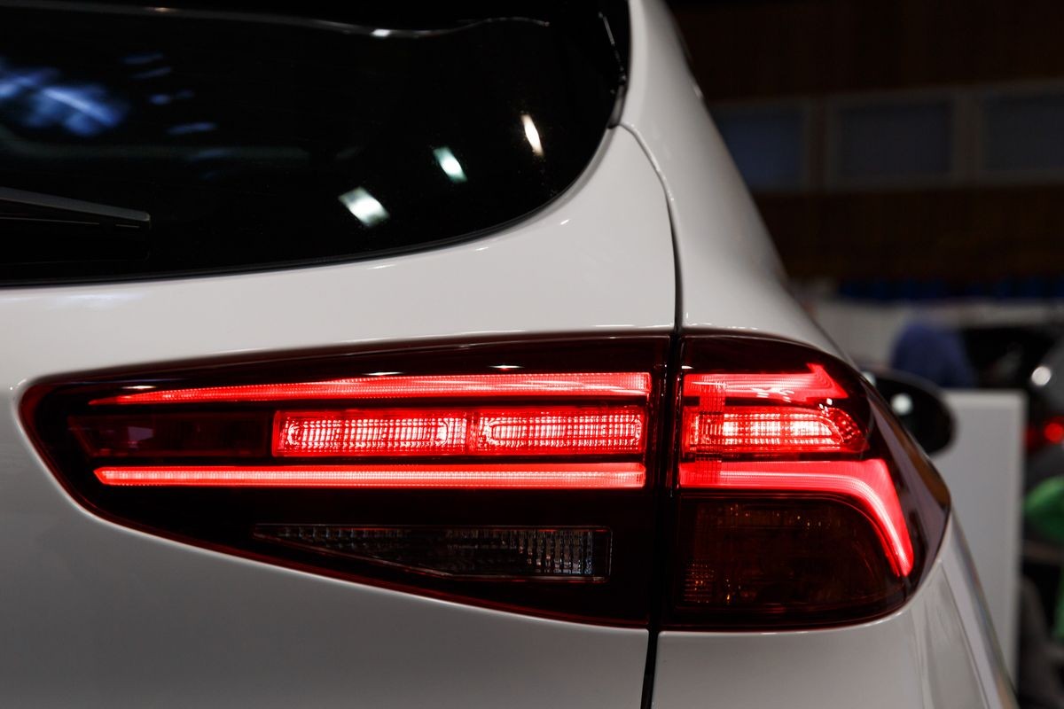Detail on the rear light of a car. Car detail. Developed Car's rear brake light Detail on the rear light of a car. Car detail. Developed Car's rear brake light